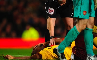 Arsenal’s title hopes stretchered off with Johan Djourou